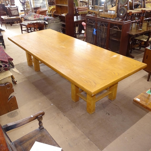 2239 - An extremely large oak rectangular dining/boardroom table, on 2 4 square-legged stands, L300cm, H74c... 