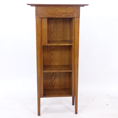 2248 - An Arts and Crafts oak open bookcase of tapered form, W58cm, H116cm, D25cm