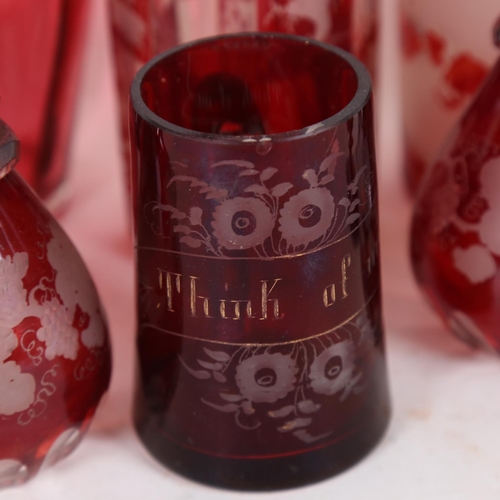 225 - A set of cranberry overlay etched glass, including Whisky decanter, small tankard, goblets etc