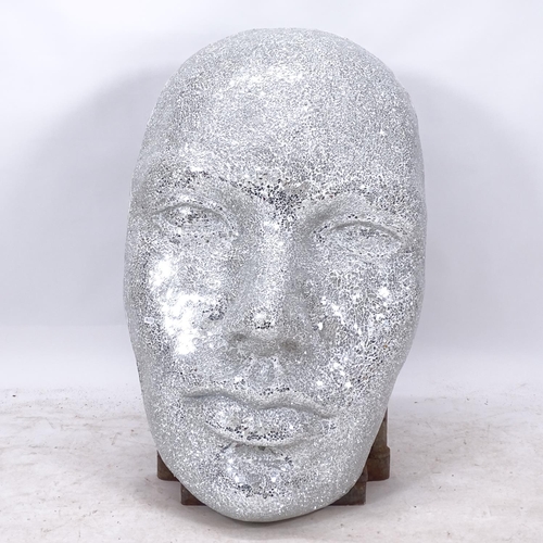 2358 - A decorative mirror-effect wall sculpture, in the form of a face, H94cm