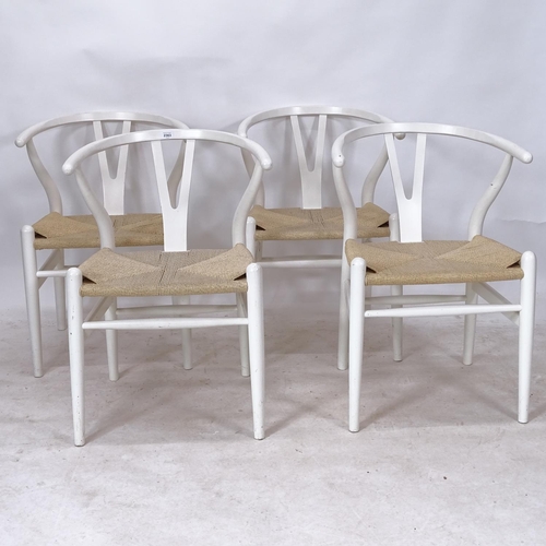 2363 - A set of 4 Hans Wegner style wishbone chairs, with white lacquer frame, and paper cord seats