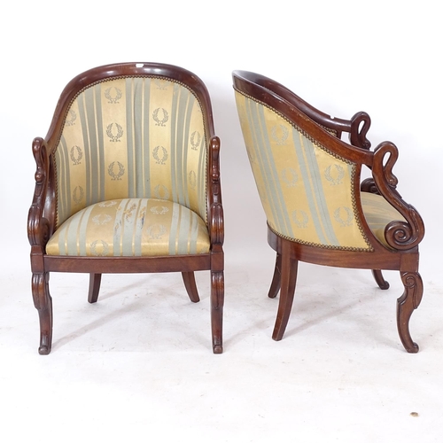 2290 - A pair of Biedermeier mahogany tub-back armchairs, with scrolled swan arms, and silk striped upholst... 