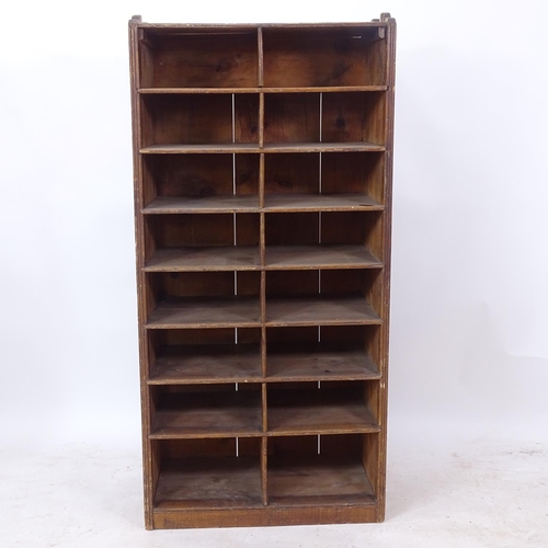 2296 - A Victorian pine bank of 16 pigeon holes, W67cm, H136cm, D38cm