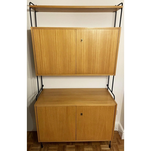 2322 - A mid-century Omnia wall unit, by Hilker, Germany, with maker's label, W88cm