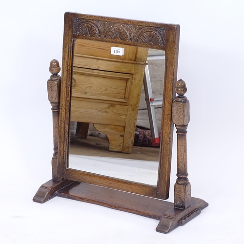 2197 - An Ipswich oak design swing toilet mirror, W50cm, H57cm