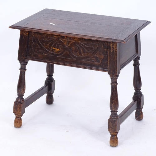 2201 - A 1920s carved oak sewing table, W54cm, H49cm, D36cm