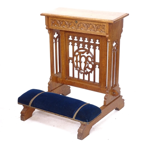 2216 - A Victorian oak Gothic prayer stand, with a rising top, with carved and pierced monogrammed panel, W... 