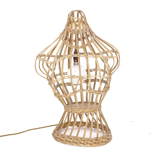 2218 - An unusual wicker table lamp in the form of a bust, height 64cm