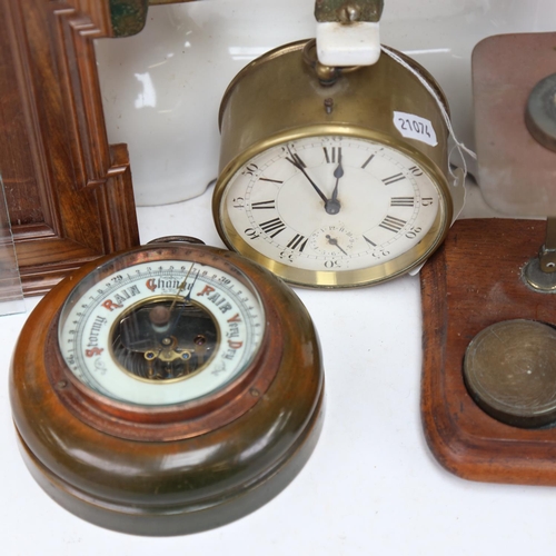 434 - An enamel balance scale, marked N Ely, St Leonards, a brass-cased clock, a barometer, postal scale a... 