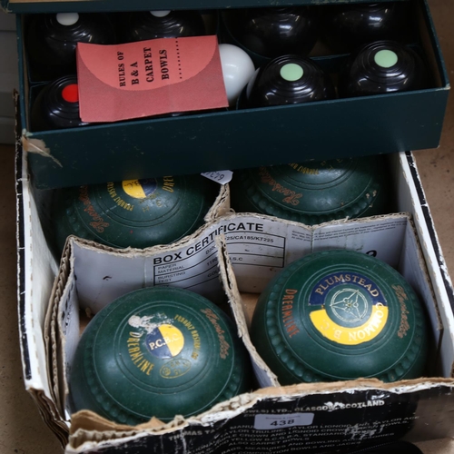 438 - A set of boules, carpet bowls, and lawn bowls