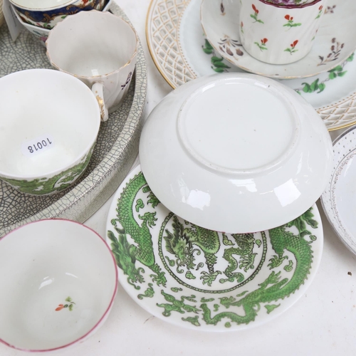 476 - A Nymphenburg plate with pierced border, 19th century and other cups and saucers etc