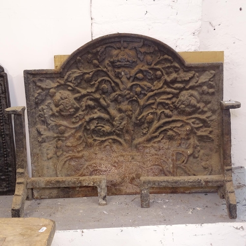 2510 - WITHDRAWN:An Antique cast-iron arch-top fireback, with embossed decoration, W87cm, H73cm, and a pair... 