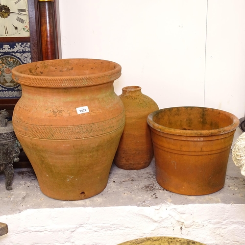 2522 - 2 terracotta garden pots, and another