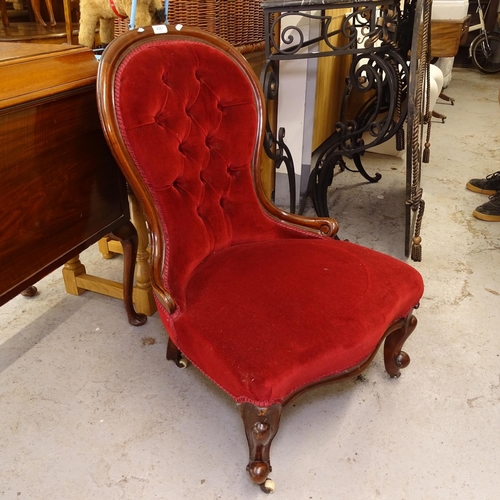 2561 - A Victorian upholstered and mahogany-framed nursing chair