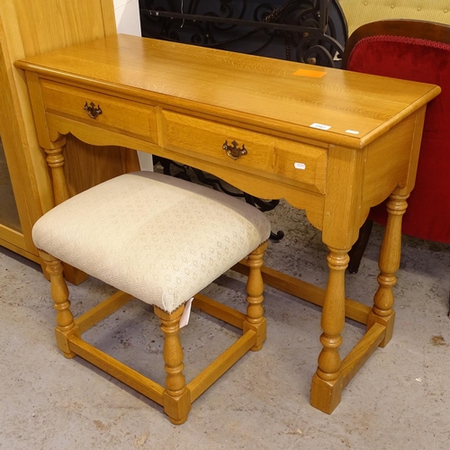 2567 - A modern oak 2-drawer dressing table, and stool, L108cm, H76cm, D41cm