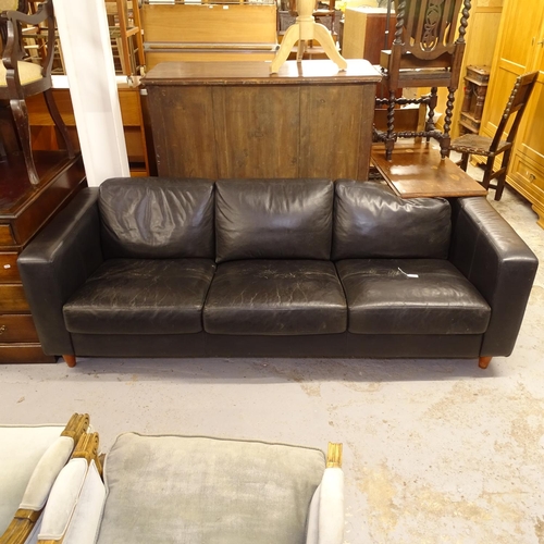 2583 - A black leather upholstered 3-seater settee, L211cm, H63cm, seat height 40cm