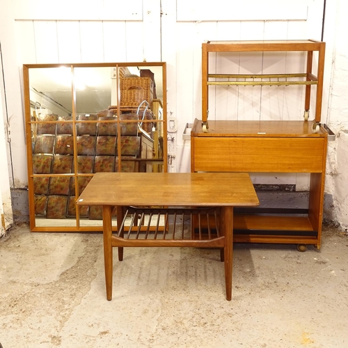 2603 - A group of mid-century teak furniture, to include a 2-tier coffee table, 2 trolleys, and a mirror