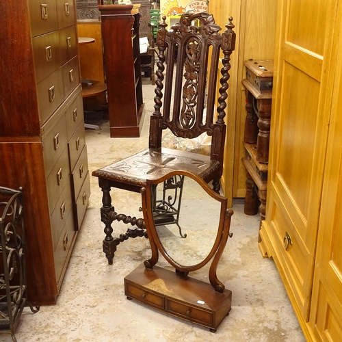 2607 - A Carolean style carved oak hall chair, and a mahogany box swing toilet mirror (2)