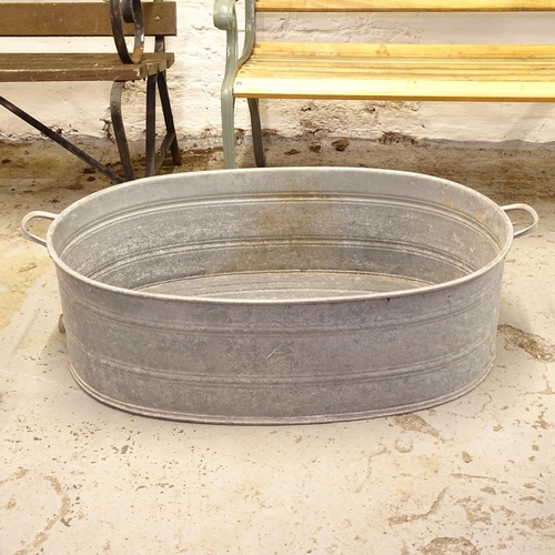 2615 - A large 2-handled galvanised metal bath, W102cm