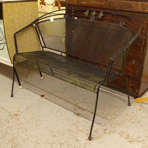 2625 - A wrought-iron bow-end garden bench, W110cm