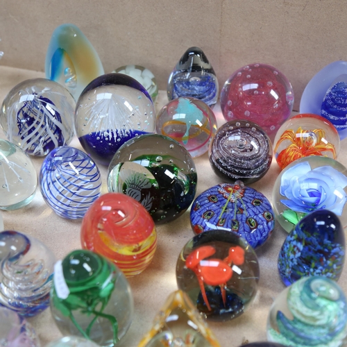 542 - A collection of glass paperweights, including Tutbury Crystal