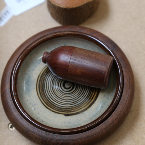 580 - A group of handmade treen items, including boxes, and a dish with ceramic liner