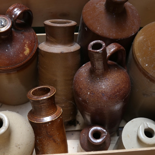 620 - Stoneware hot water bottles, including West Bros Battersea, and a box of stoneware flagons and bottl... 