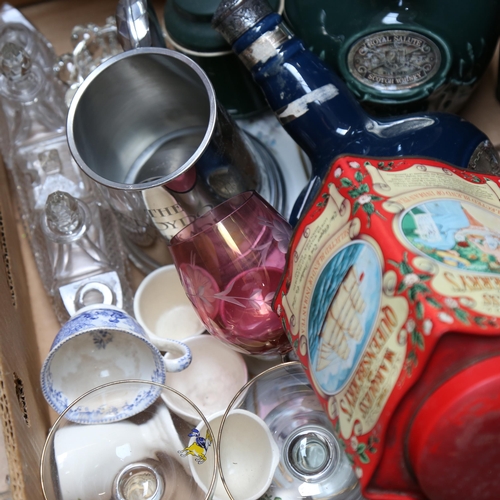 622 - Decorative tins, Babycham and other glasses, circular mirror etc