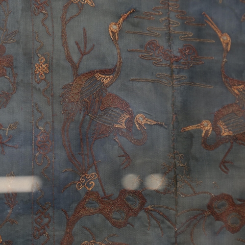 628 - An Oriental embroidered gold wirework design of birds and flowers, framed, height 89cm