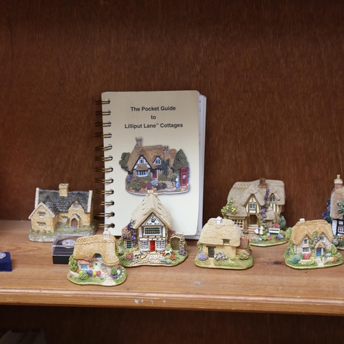 658 - A shelf of Lilliput Land and David Winter cottages