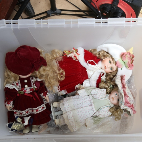 686 - A large boxful of modern dressed dolls, and a teddy bear