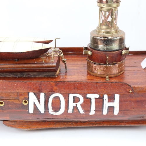 734 - A scratch-built wooden boat, North Carr, length 77cm