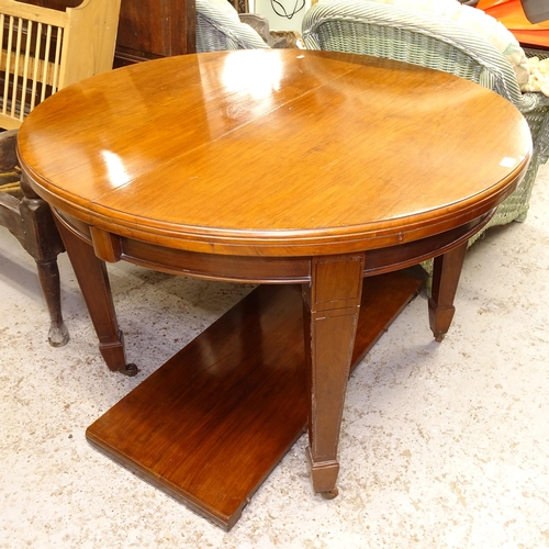 2653 - A late Victorian mahogany and ebony-strung wind-out dining table, with 1 single spare leaf, raised o... 