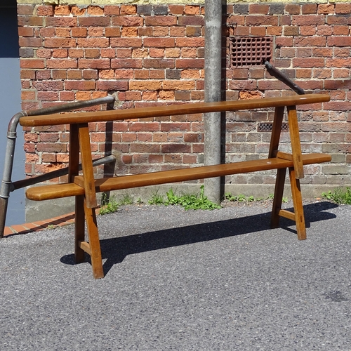 2662 - A pair of cherrywood benches, on splayed leg base, L190cm