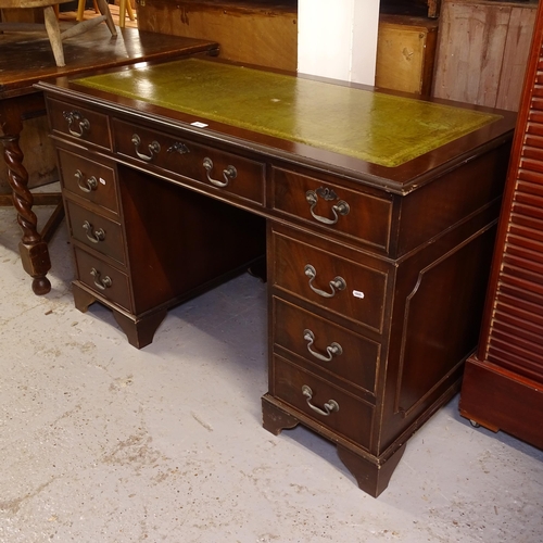 2677 - A reproduction mahogany twin-pedestal writing desk, W122cm, H76cm, D60cm, kneehole width 60cm and he... 