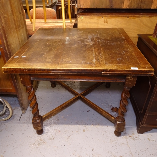 2679 - A square oak draw leaf table, on cross stretchers and barley twist legs, W92cm, H75cm