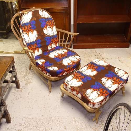 2680 - An Ercol stick-back armchair, and matching footstool, with loose cushions (A/F)