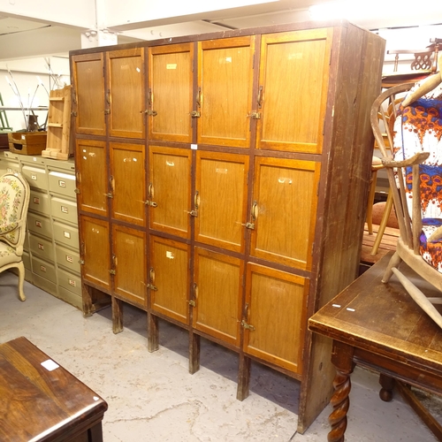 2681 - A Vintage Japanese teak-framed chemist's cabinet, with 15 cupboard doors, W170cm, H174cm, D48cm