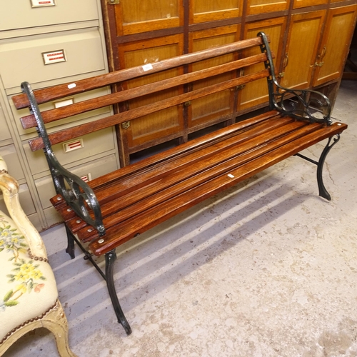 2683 - A painted wrought-iron and teak slatted garden bench, L122cm