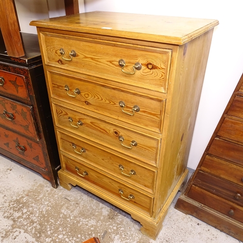 2709 - A waxed pine chest of 5 long drawers, W71cm, H104cm, D48cm