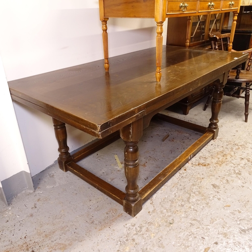 2715 - A large rectangular oak refectory draw leaf dining table, on baluster turned legs, L183cm extending ... 