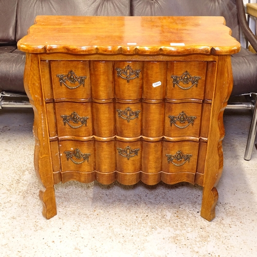 2725 - A small Continental beech bombe chest of 3 short drawers, W64cm, H62cm, D36cm