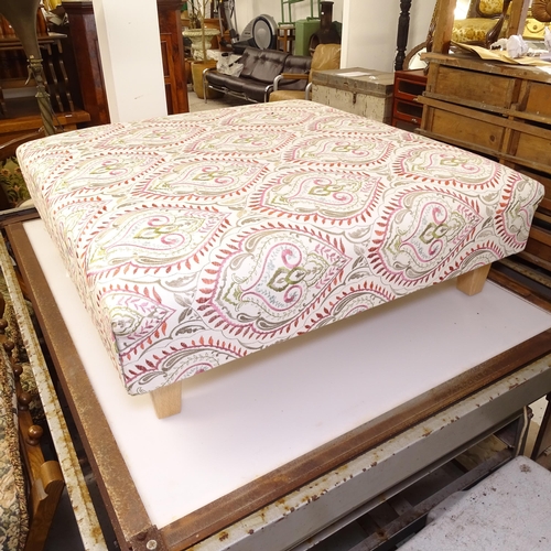 2734 - A large square footstool, with cream patterned upholstery, W92cm, H28cm