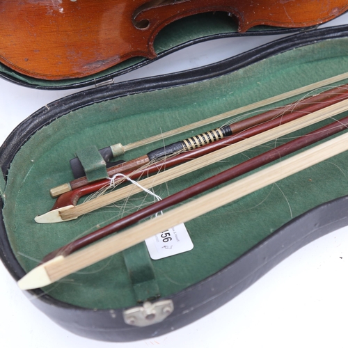 740 - A 3/4 size violin in case, with bow, labelled Made in China