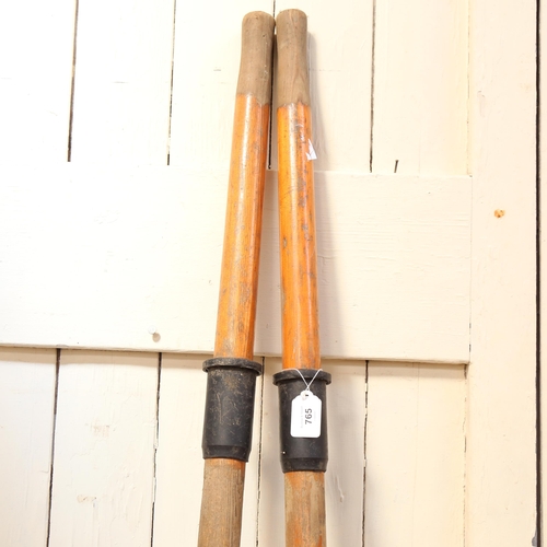 765 - A pair of Norvall wooden oars, length 195cm