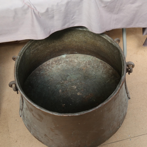 774 - A large Antique copper pan, with drop handles, diameter 60cm