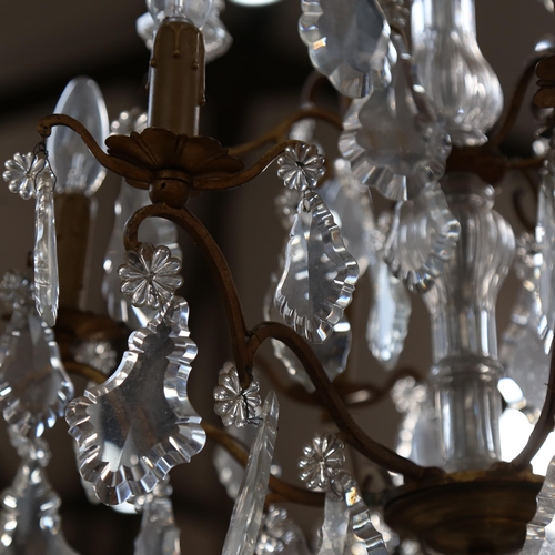 792 - A brass chandelier, with ornate cut-glass drops, diameter 50cm