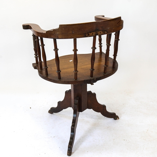 2222 - An early 20th century swivel chair (possibly originally a barber's with fittings missing)