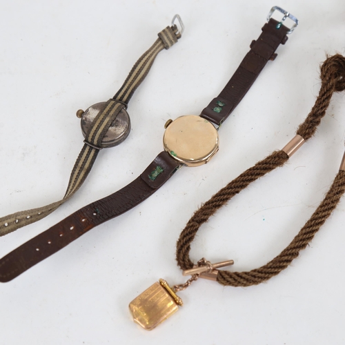 1009 - An early 20th century 9ct gold wristwatch, a First World War Period silver-cased Officer's wristwatc... 