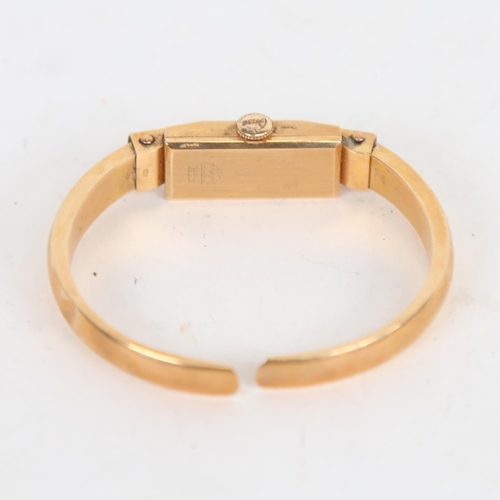 1015 - A lady's Vintage 18ct gold bangle bracelet watch, by Onsa, with 18ct hinged bracelet, 11.1g gross